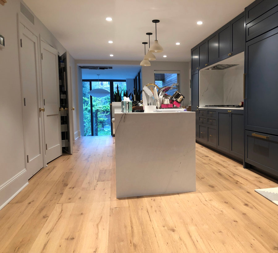 Reclaimed wood flooring in a completed interior