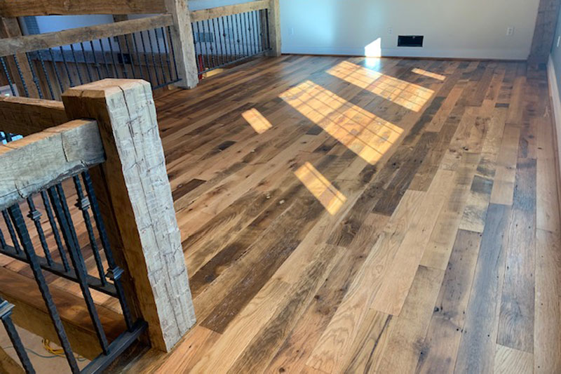 Reclaimed wood flooring in a completed interior