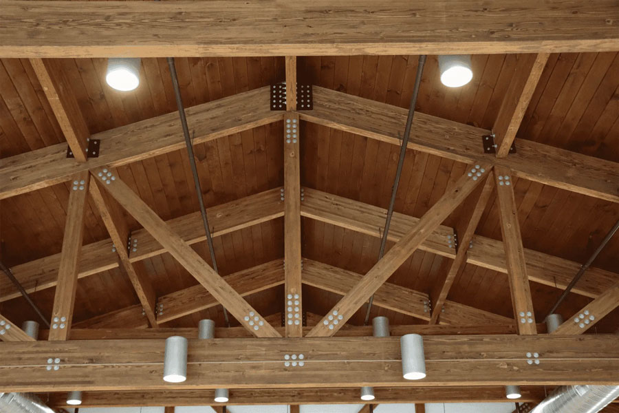 White oak trusses in a timber-framed space