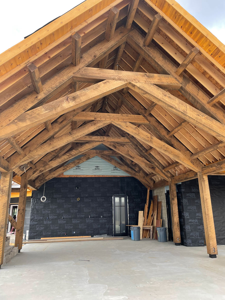 White oak trusses in a timber-framed space